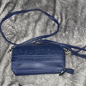 Kenneth Cole reaction navy blue crossbody bag.